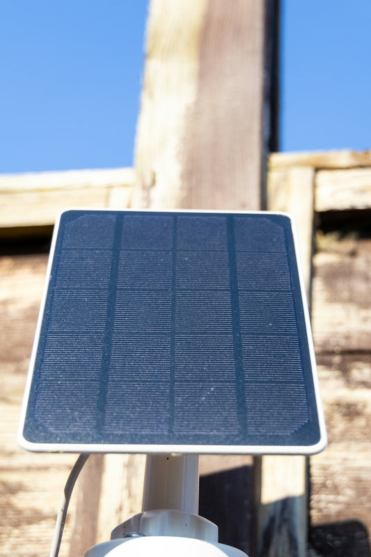 A close up of a street sign with a sky background